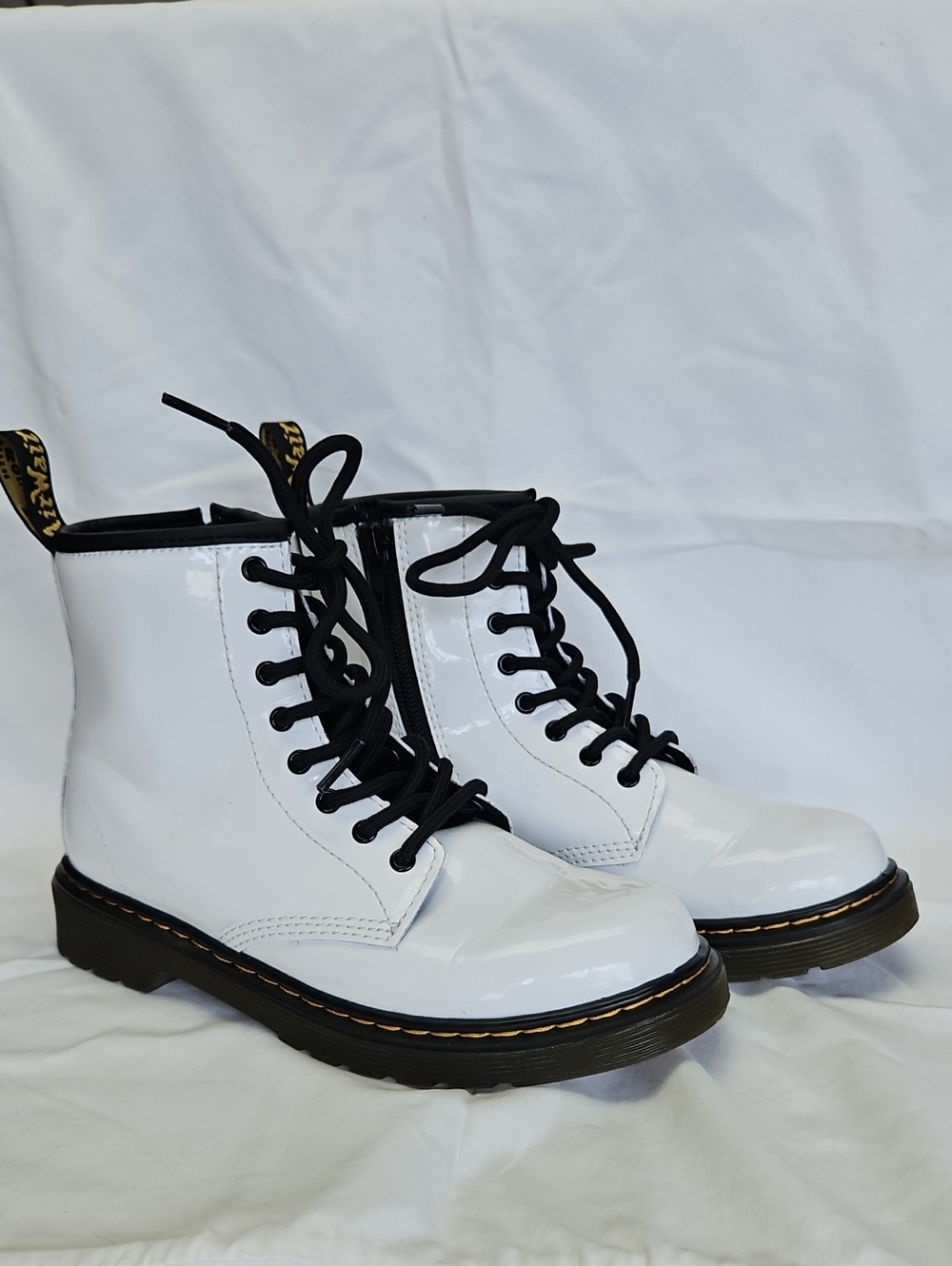 Dr. Martens White Patent Lace-Up Boots with Black Laces